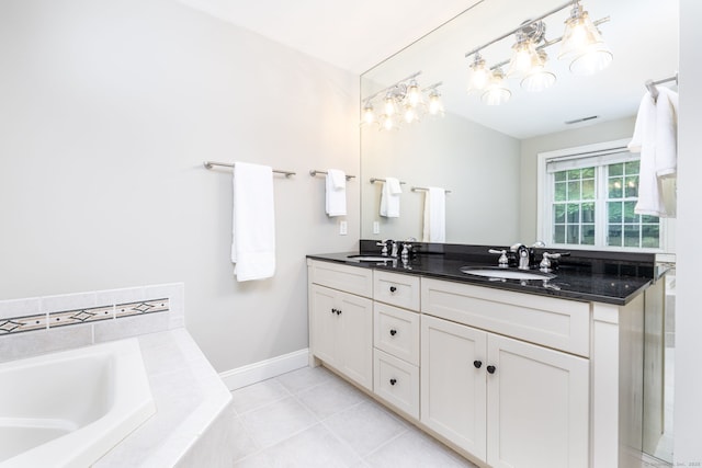 133 Hoop Pole Hill Rd, Woodbury, CT 06798 - bathroom with double vanity, a garden tub, a chandelier, tile patterned floors, and baseboards