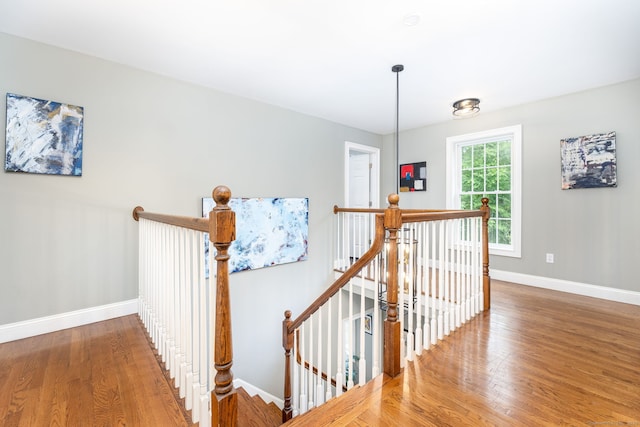 133 Hoop Pole Hill Rd, Woodbury, CT 06798 - hallway with an upstairs landing, wood finished floors, and baseboards