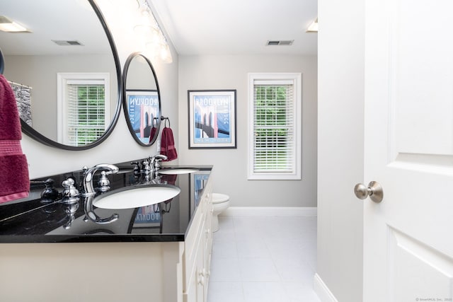 133 Hoop Pole Hill Rd, Woodbury, CT 06798 - bathroom featuring toilet, vanity, tile patterned flooring, and baseboards