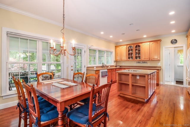10 Deer Park Rd, Danbury, CT 06811 - dining area featuring a chandelier, ornamental molding, plenty of natural light, recessed lighting, and light wood-style floors