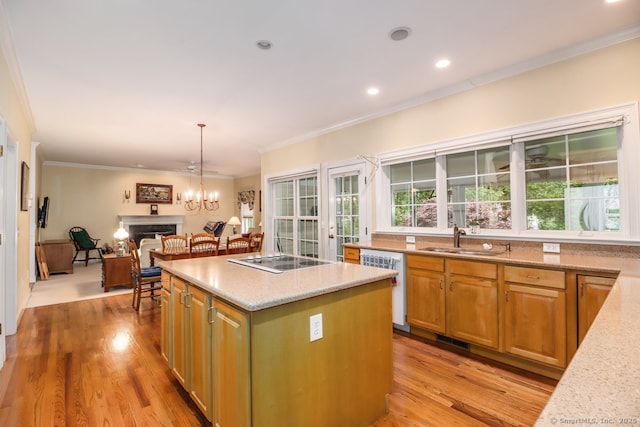 10 Deer Park Rd, Danbury, CT 06811 - kitchen featuring dishwashing machine, a sink, electric cooktop, light wood finished floors, and a kitchen island