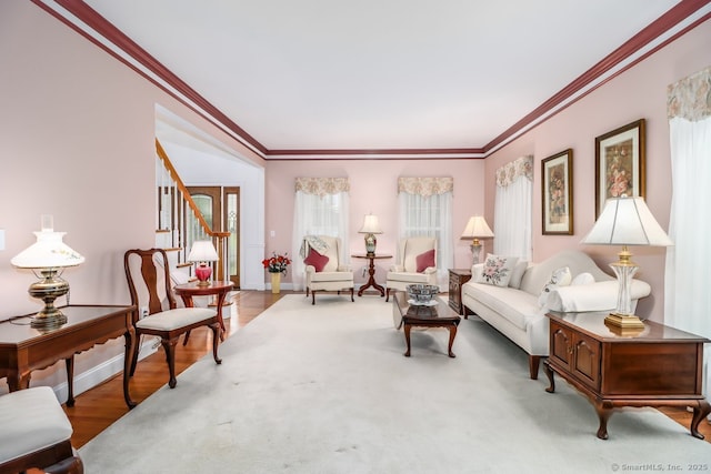 10 Deer Park Rd, Danbury, CT 06811 - living room with ornamental molding, baseboards, and wood finished floors
