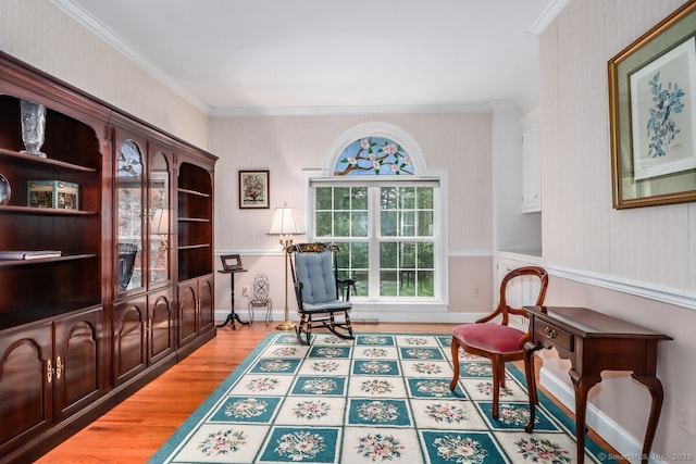 10 Deer Park Rd, Danbury, CT 06811 - living area featuring crown molding, wood finished floors, wallpapered walls, and baseboards