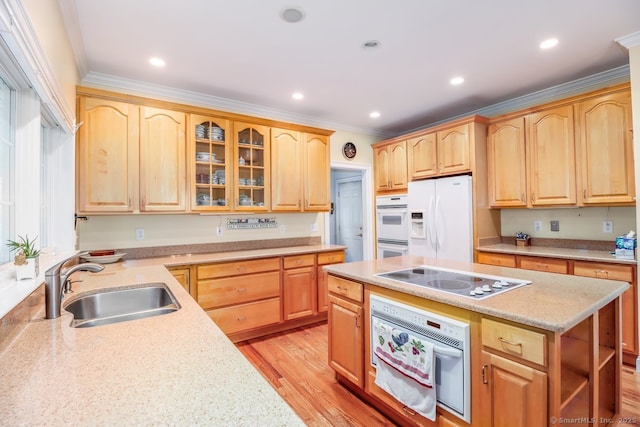10 Deer Park Rd, Danbury, CT 06811 - kitchen with white appliances, a sink, light brown cabinets, crown molding, and glass insert cabinets