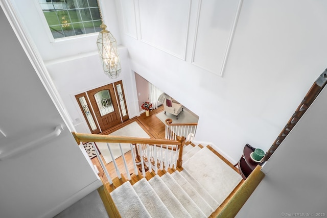 10 Deer Park Rd, Danbury, CT 06811 - stairway featuring a chandelier and wood finished floors