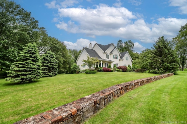 10 Deer Park Rd, Danbury, CT 06811 - view of front of property featuring a front lawn and a chimney