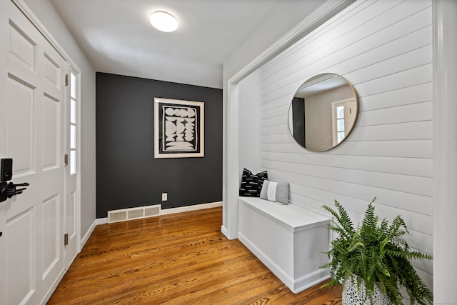 126 Newfield St, Middletown, CT 06457 - foyer entrance featuring light wood-style floors, baseboards, and wood walls