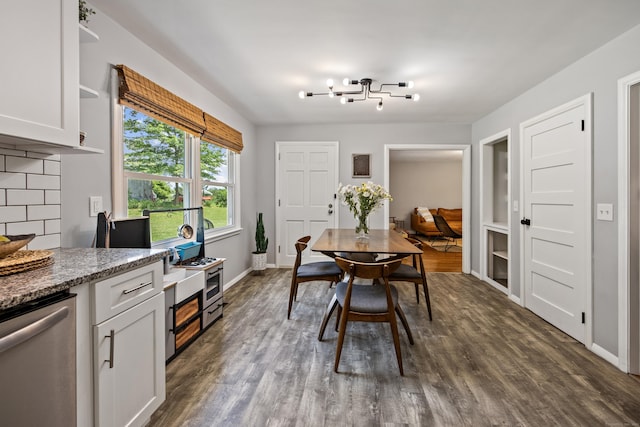 126 Newfield St, Middletown, CT 06457 - dining space with dark wood finished floors, baseboards, and a chandelier