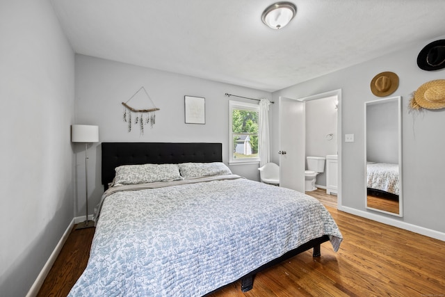 126 Newfield St, Middletown, CT 06457 - bedroom with wood finished floors, baseboards, and ensuite bathroom