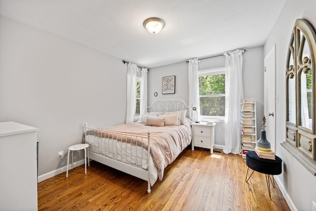 126 Newfield St, Middletown, CT 06457 - bedroom with wood-type flooring and baseboards