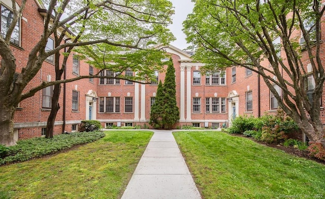 492 Whitney Ave Unit 4B, New Haven, CT 06511 - view of front of home with brick siding and a front yard