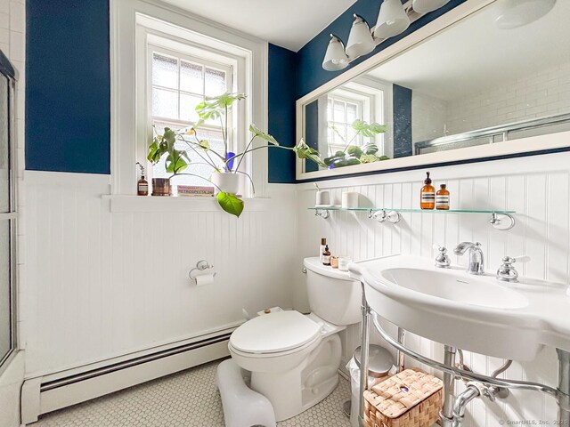 492 Whitney Ave Unit 4B, New Haven, CT 06511 - full bath with baseboard heating, a wainscoted wall, plenty of natural light, toilet, and a shower with door