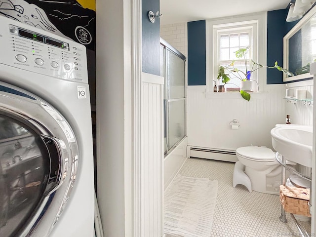 492 Whitney Ave Unit 4B, New Haven, CT 06511 - laundry area featuring a baseboard heating unit, a wainscoted wall, and washer / clothes dryer