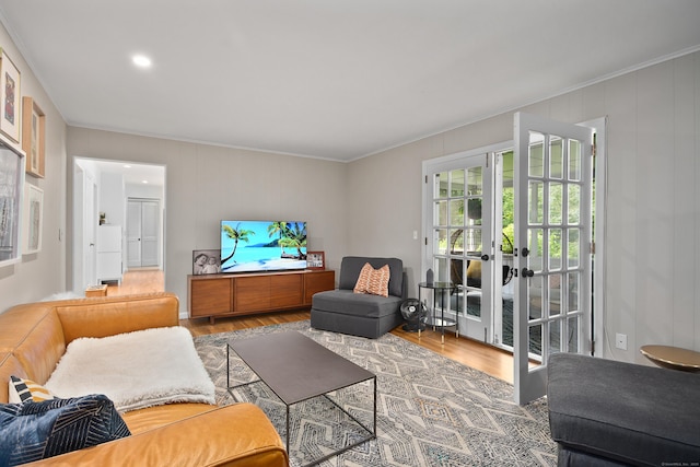 68 Blue Spruce Cir, Weston, CT 06883 - living area with ornamental molding, wood finished floors, french doors, and recessed lighting