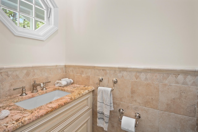 68 Blue Spruce Cir, Weston, CT 06883 - bathroom with vanity, a wainscoted wall, and tile walls