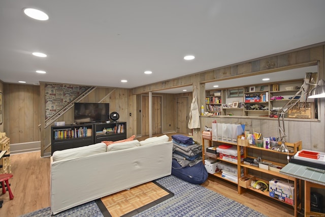 68 Blue Spruce Cir, Weston, CT 06883 - living room with wood walls, recessed lighting, and wood finished floors