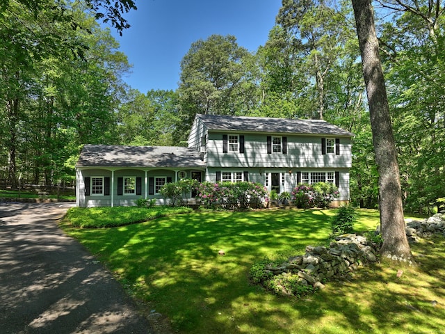 68 Blue Spruce Cir, Weston, CT 06883 - colonial inspired home with a front lawn and driveway