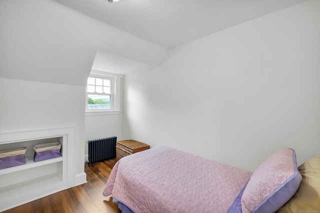 8 Wild Rose Pl, Waterford, CT 06385 - bedroom with radiator heating unit, wood finished floors, and lofted ceiling