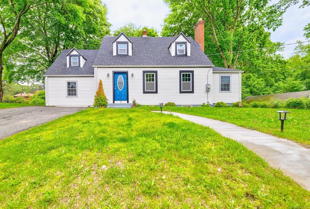 8 Wild Rose Pl, Waterford, CT 06385 - cape cod-style house with a chimney, a front yard, a shingled roof, and driveway