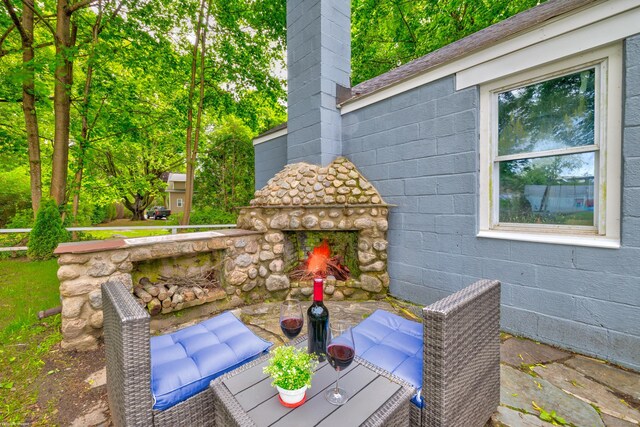 8 Wild Rose Pl, Waterford, CT 06385 - view of patio with an outdoor stone fireplace