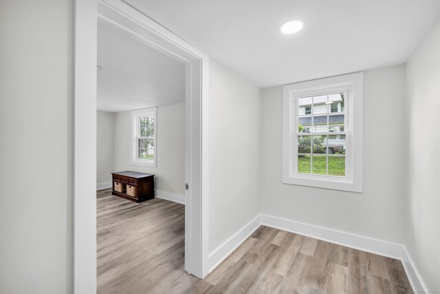 8 Wild Rose Pl, Waterford, CT 06385 - spare room featuring light wood finished floors and baseboards