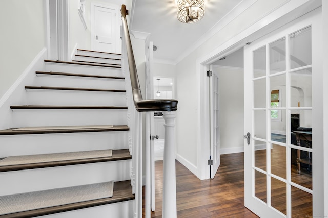 8 Wild Rose Pl, Waterford, CT 06385 - stairway with ornamental molding, wood finished floors, baseboards, and french doors