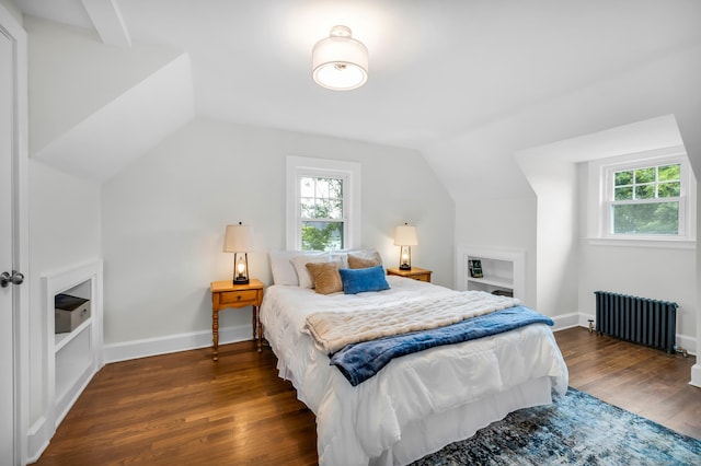 8 Wild Rose Pl, Waterford, CT 06385 - bedroom featuring radiator, lofted ceiling, multiple windows, dark wood finished floors, and baseboards