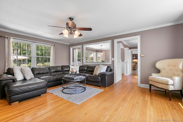 452 Burnt Plains Rd, Milford, CT 06461 - living area featuring ceiling fan, light wood-type flooring, healthy amount of natural light, crown molding, and baseboards