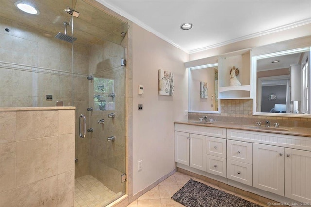 452 Burnt Plains Rd, Milford, CT 06461 - bathroom featuring a shower stall, ornamental molding, double vanity, tasteful backsplash, and tile patterned floors
