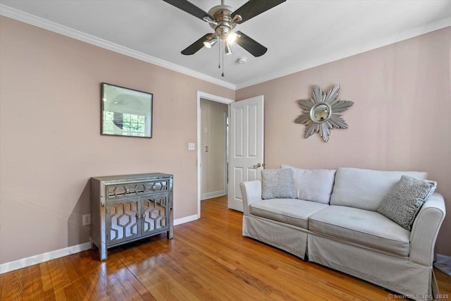 452 Burnt Plains Rd, Milford, CT 06461 - living room featuring ornamental molding, baseboards, a ceiling fan, and wood finished floors