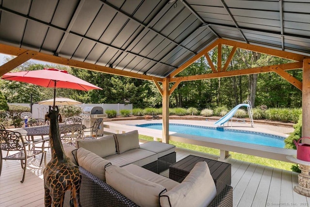 452 Burnt Plains Rd, Milford, CT 06461 - swimming pool featuring a water slide, an outdoor living space, a deck, and a grill