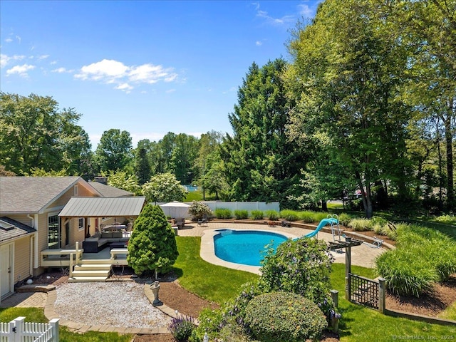 452 Burnt Plains Rd, Milford, CT 06461 - view of pool featuring a wooden deck, a water slide, a fenced backyard, and an outdoor hangout area