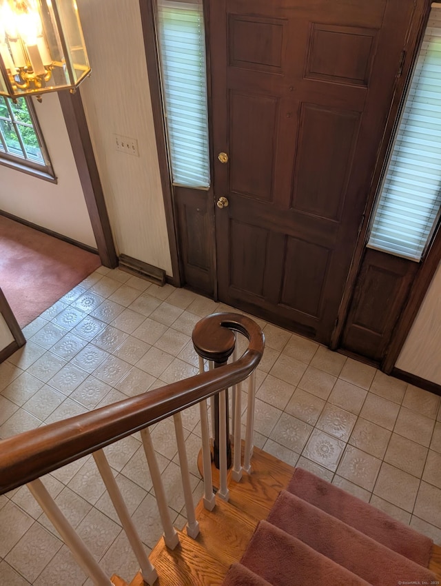 1060 Still Hill Rd, Hamden, CT 06518 - entrance foyer with baseboards and a chandelier