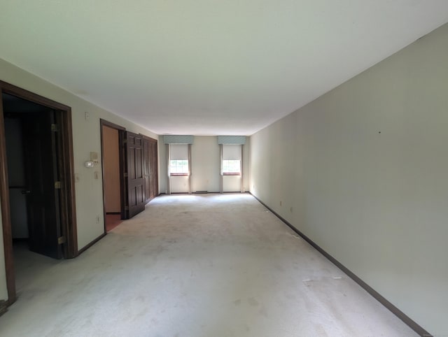 1060 Still Hill Rd, Hamden, CT 06518 - empty room featuring light carpet and baseboards