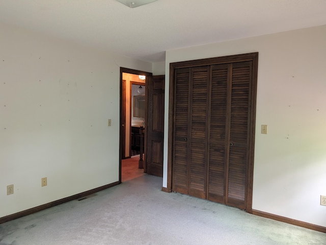 1060 Still Hill Rd, Hamden, CT 06518 - unfurnished bedroom featuring light colored carpet and a closet