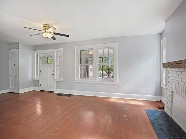 1 Raymond Ter, Norwalk, CT 06855 - unfurnished living room featuring wood finished floors, a fireplace, and a ceiling fan