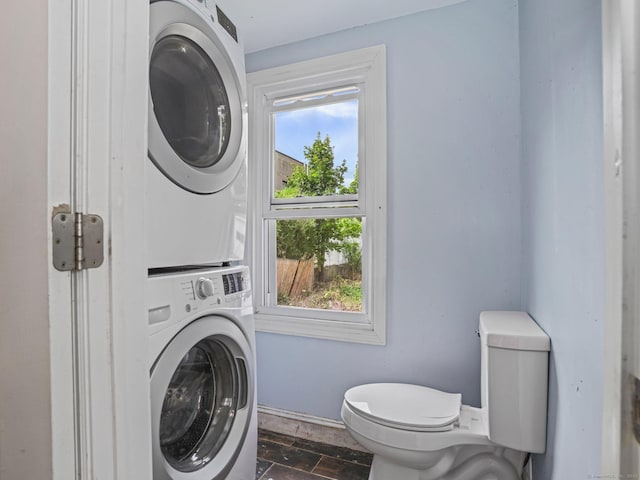1 Raymond Ter, Norwalk, CT 06855 - laundry room with stacked washer / drying machine and baseboards