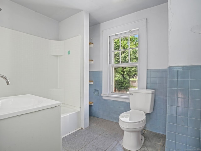 1 Raymond Ter, Norwalk, CT 06855 - full bath with tile walls, tile patterned floors, bathing tub / shower combination, vanity, and wainscoting