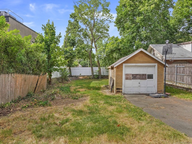 1 Raymond Ter, Norwalk, CT 06855 - fenced backyard with an outdoor structure and asphalt driveway