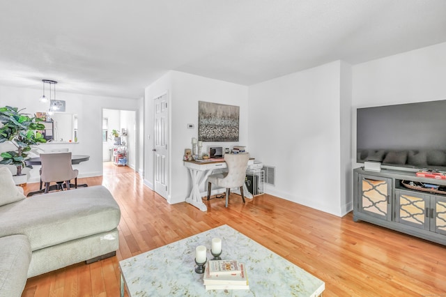 196 New Haven Ave Unit 322, Derby, CT 06418 - living room featuring wood finished floors and baseboards