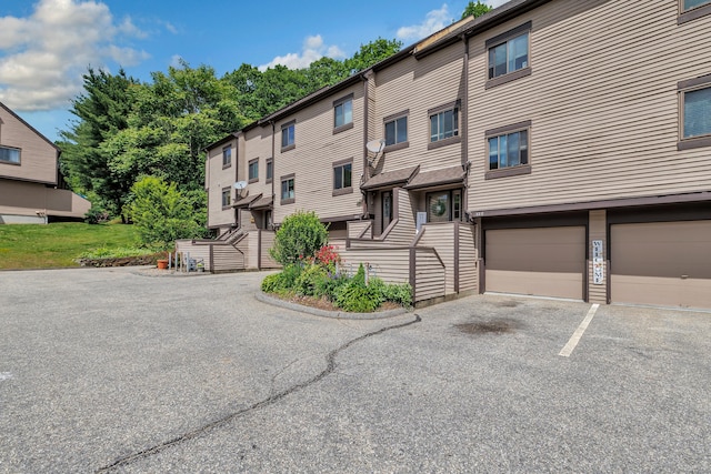196 New Haven Ave Unit 322, Derby, CT 06418 - view of front of property featuring a garage and driveway