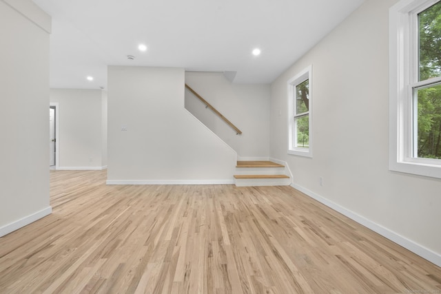 123 Lower Rd, North Canaan, CT 06024 - unfurnished living room featuring stairs, wood finished floors, and recessed lighting