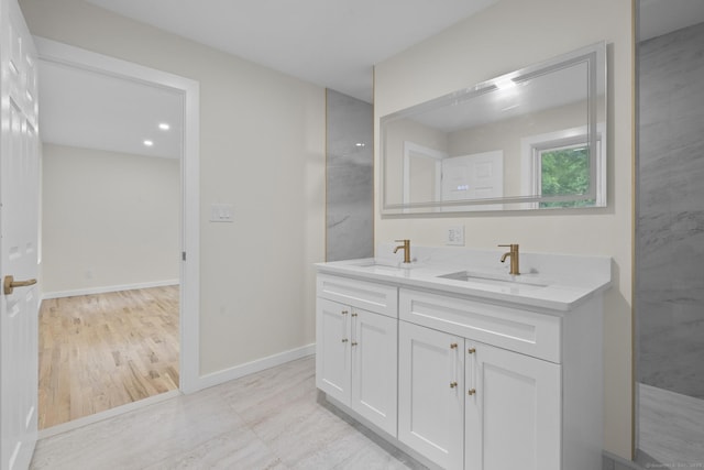 123 Lower Rd, North Canaan, CT 06024 - full bathroom with double vanity and baseboards
