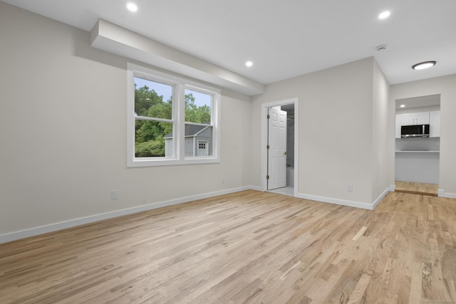 123 Lower Rd, North Canaan, CT 06024 - unfurnished bedroom featuring light wood-style floors, a spacious closet, and recessed lighting