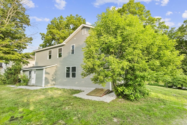 123 Lower Rd, North Canaan, CT 06024 - rear view of property featuring a yard