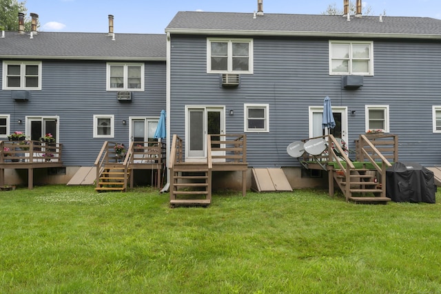 107 Greens Loop, Cheshire, CT 06410 - rear view of house with a deck, a yard, cooling unit, and a wall unit AC