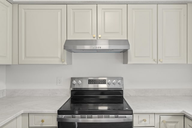 107 Greens Loop, Cheshire, CT 06410 - kitchen featuring electric stove, exhaust hood, and light countertops