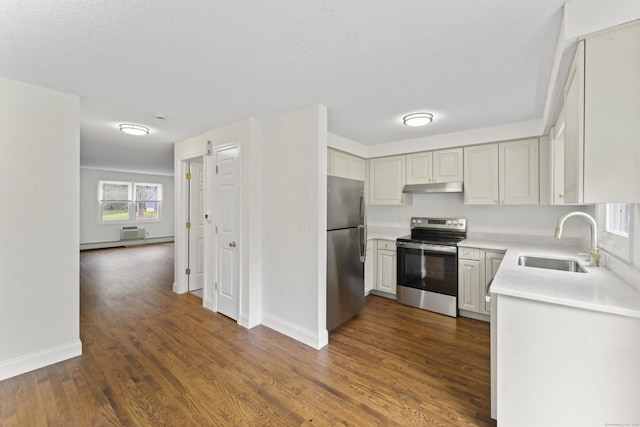 107 Greens Loop, Cheshire, CT 06410 - kitchen with appliances with stainless steel finishes, under cabinet range hood, light countertops, dark wood-type flooring, and a wall mounted AC