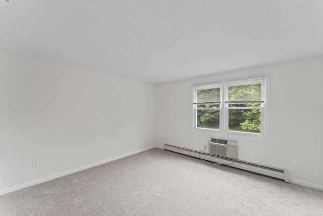 107 Greens Loop, Cheshire, CT 06410 - spare room with a baseboard radiator, carpet, and a wall mounted AC
