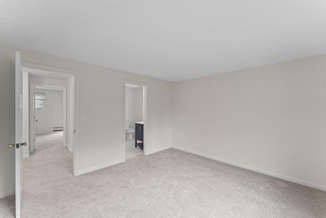 107 Greens Loop, Cheshire, CT 06410 - unfurnished room featuring light colored carpet and baseboard heating